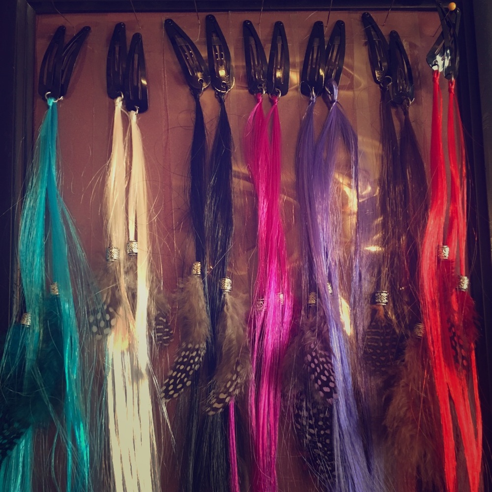 Clip-in feather hair extensions